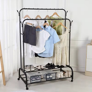 Multipurpose Metal Garment Stand with Hanged Clothes.