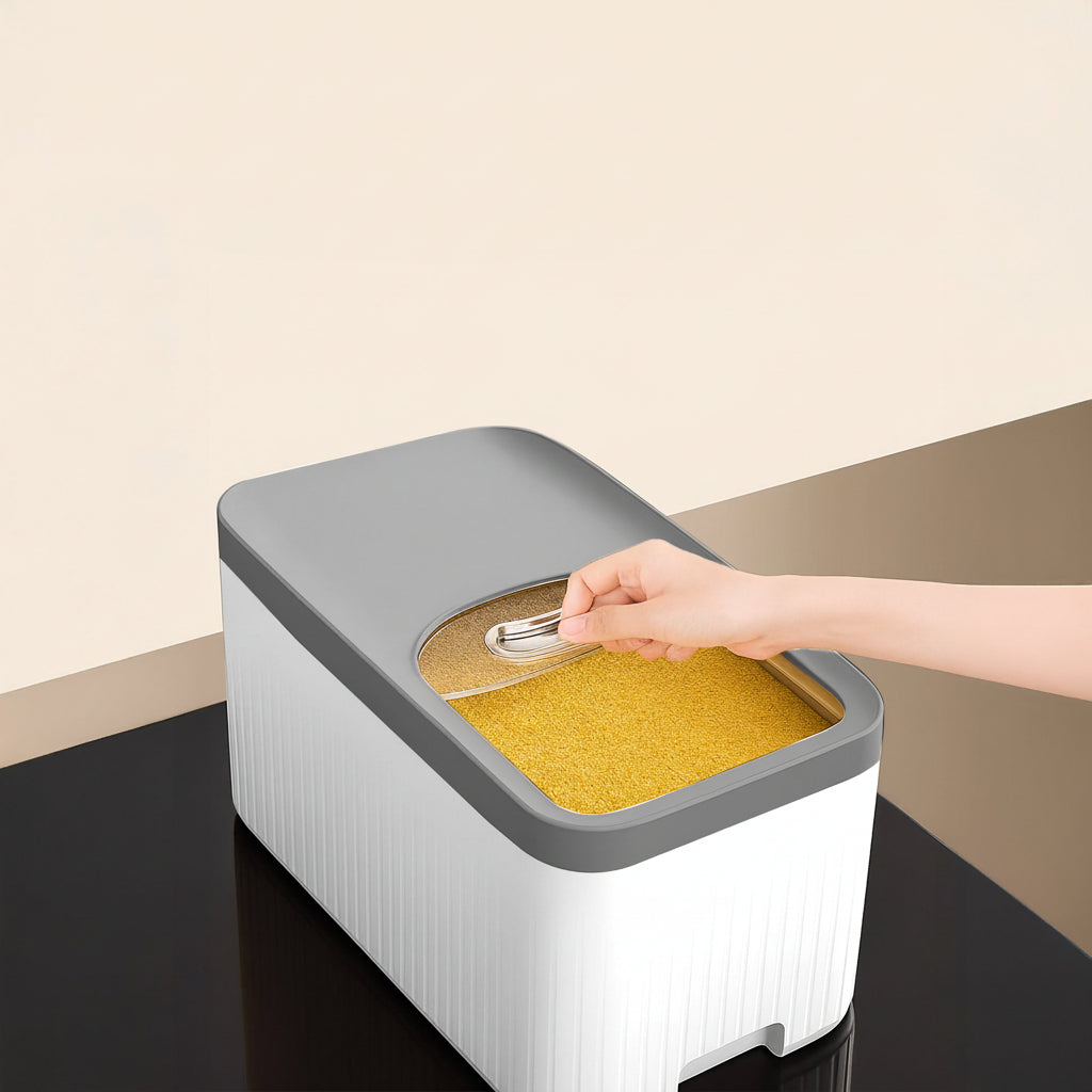 Transparent sliding cover for a20L Multi-Functional Rice Storage Bucket with a hand opening it, on a beige background.
