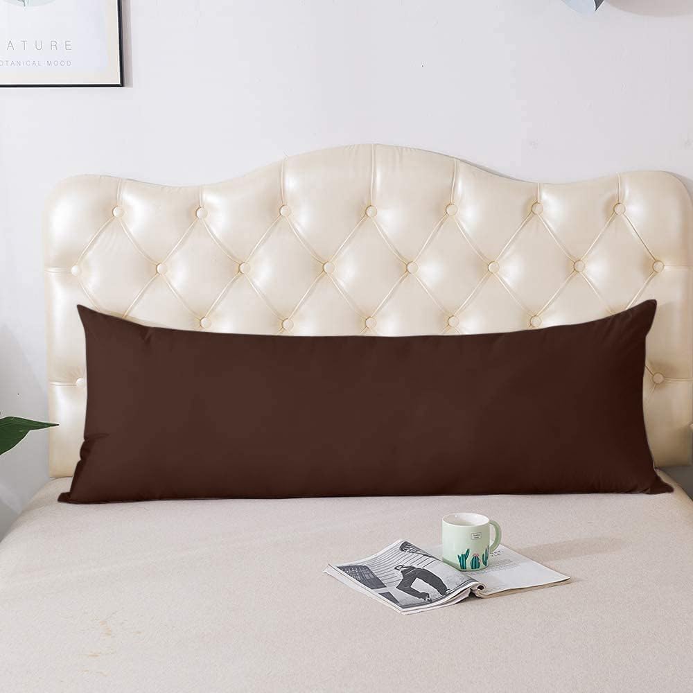 A Body Pillow is Kept On the Cot.