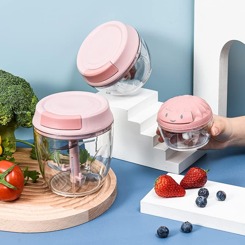 A Person is Holding Manual Food Processor.