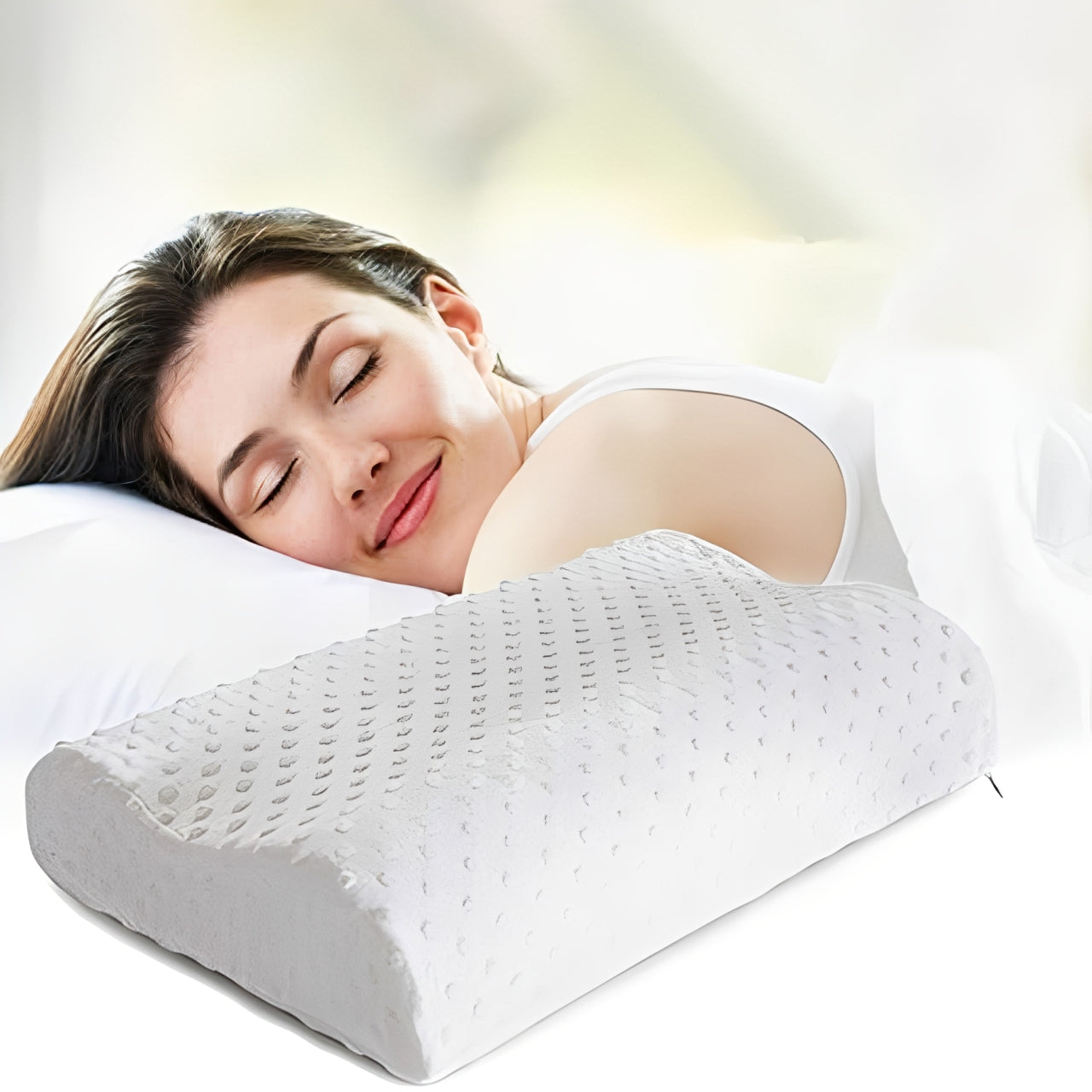 A woman peacefully sleeping on a contoured memory foam pillow, highlighting comfort and ergonomic neck support