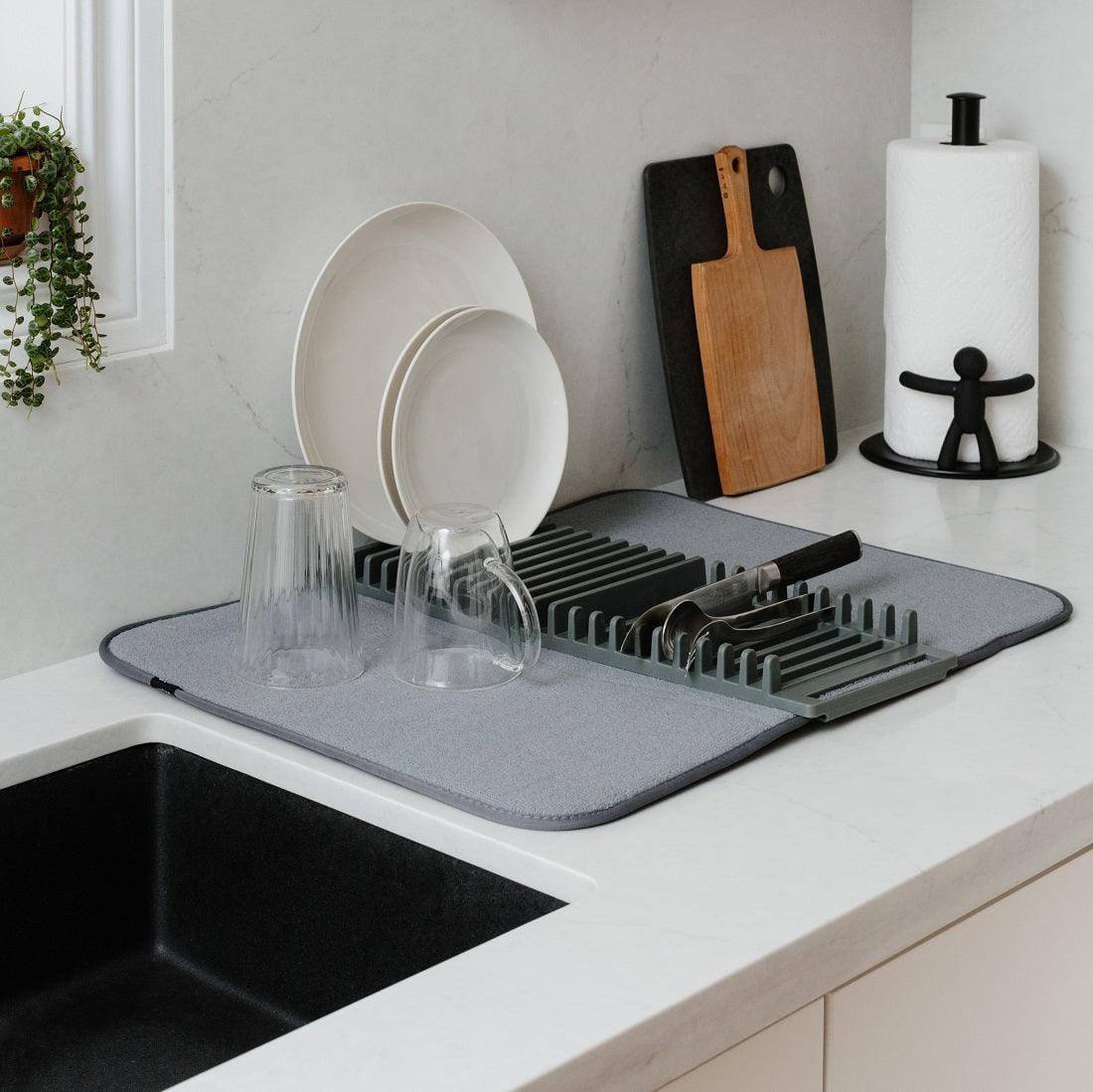 Plates are Organized in a Kitchen Dish Rack.