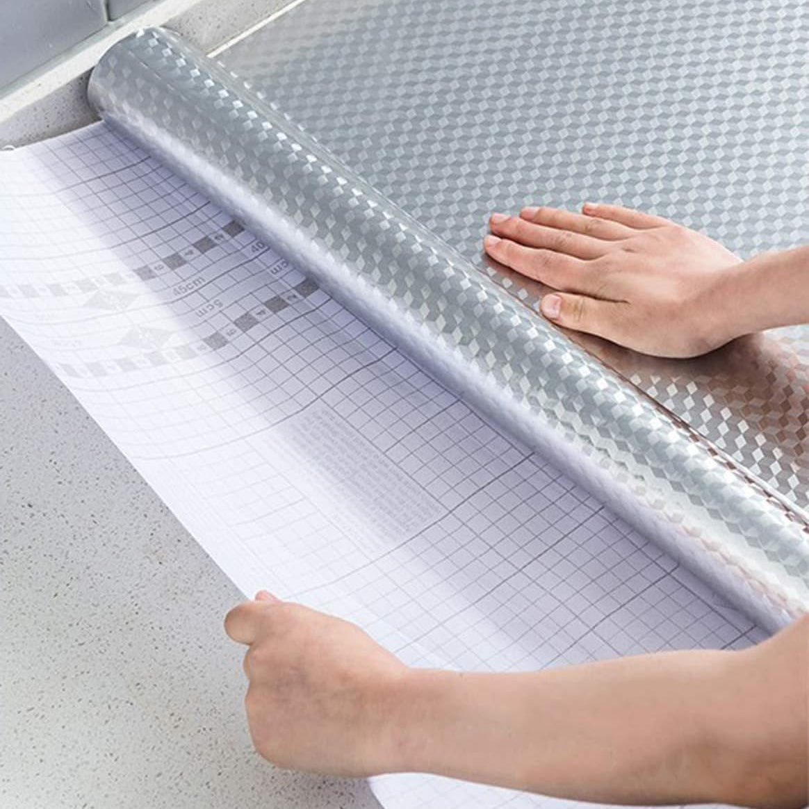 A Person is Peeling Self Adhesive Wallpaper.