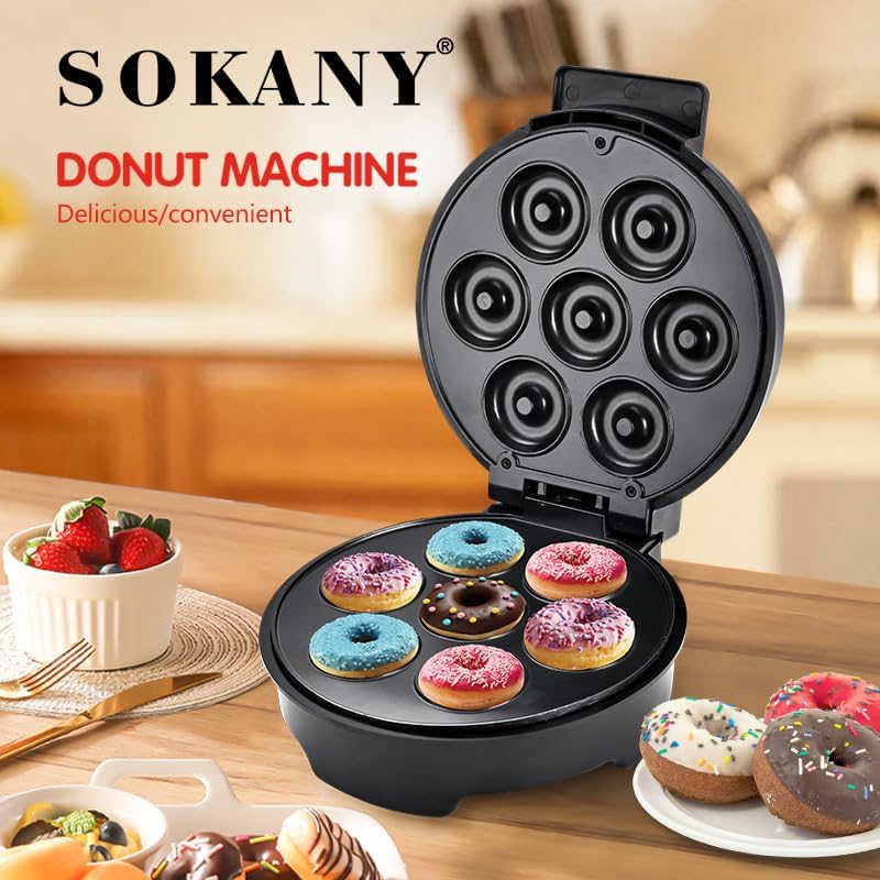 Sokany donut machine with various donuts on a wooden table