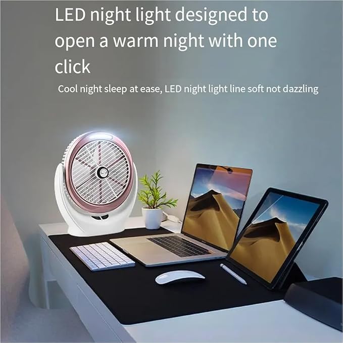 Desk setup with COB Light Multifunction USB Rechargeable Desktop Fan, laptop, tablet, and keyboard on a dark surface.