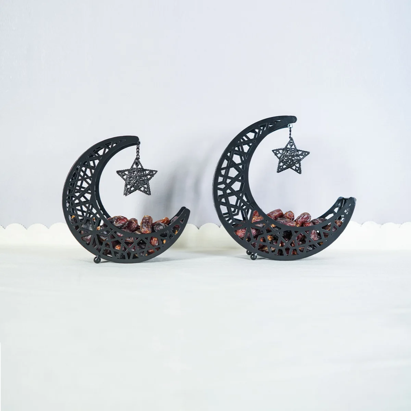 Ramadan Eid Crescent Dates Holders with Dates are Arranged in a Table.