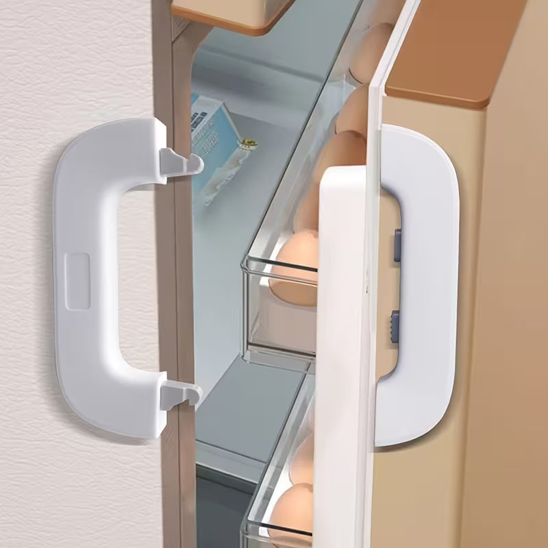 A close-up of a refrigerator door featuring a refrigerator child safety lock.