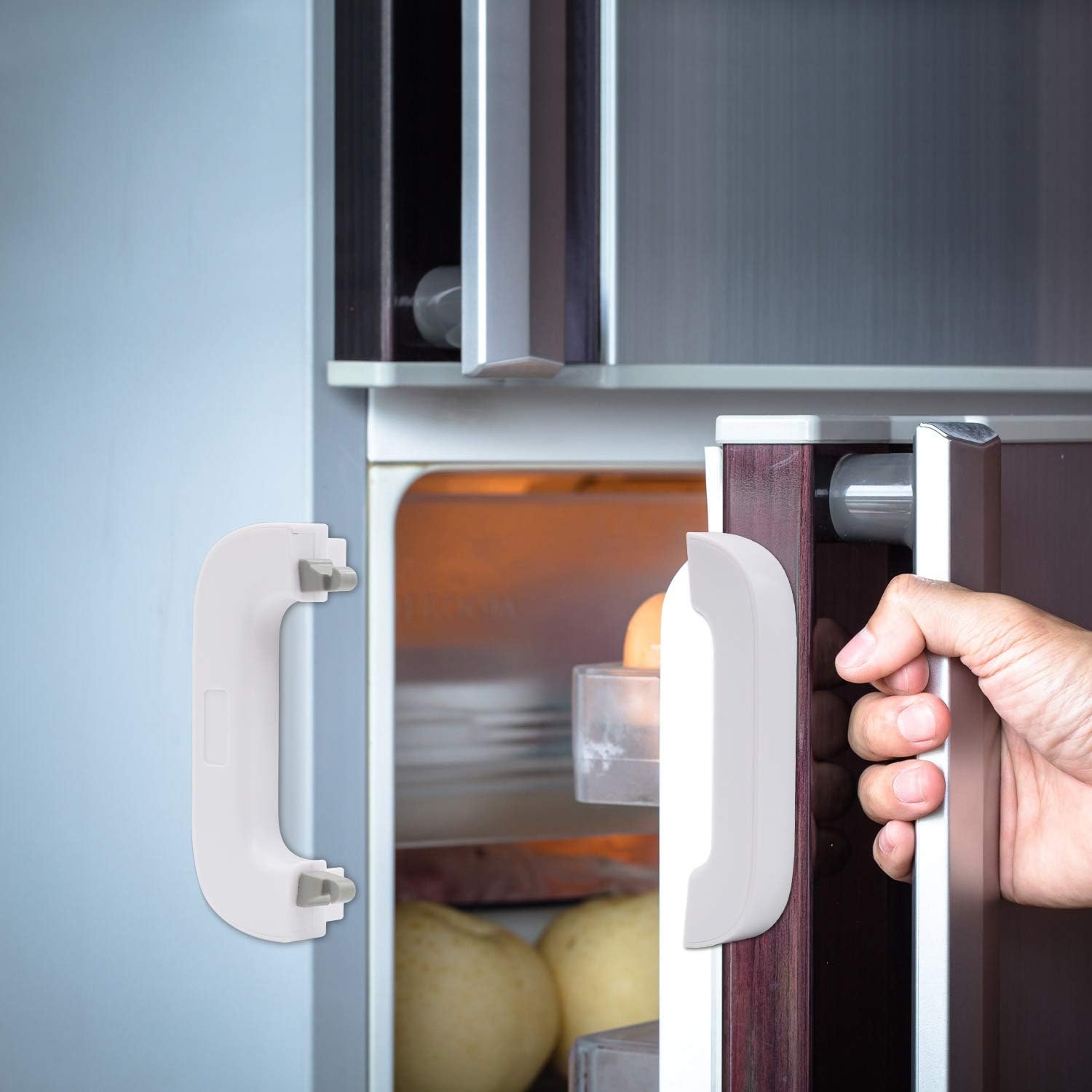 A hand opening a refrigerator door equipped with a refrigerator child safety lock, revealing the interior