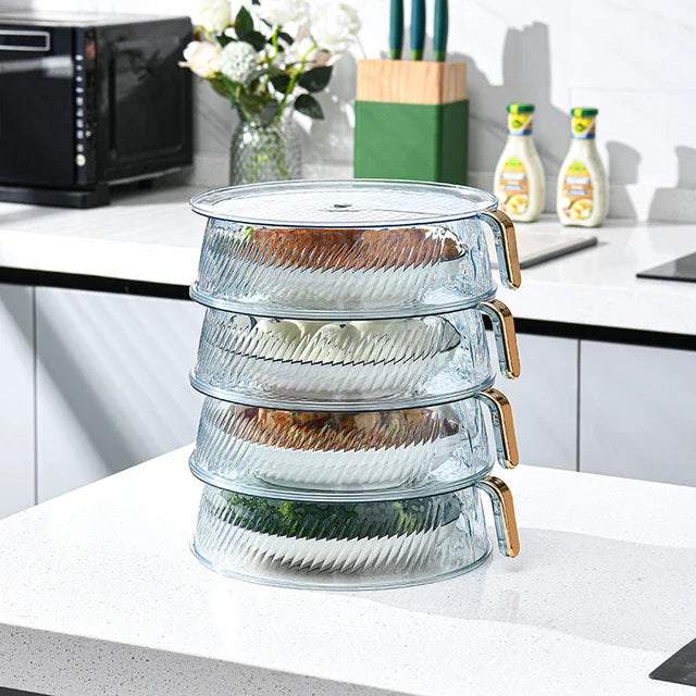 Four plastic food storage containers with handles, stackable for easy storage. Ideal for keeping fruits and vegetables fresh