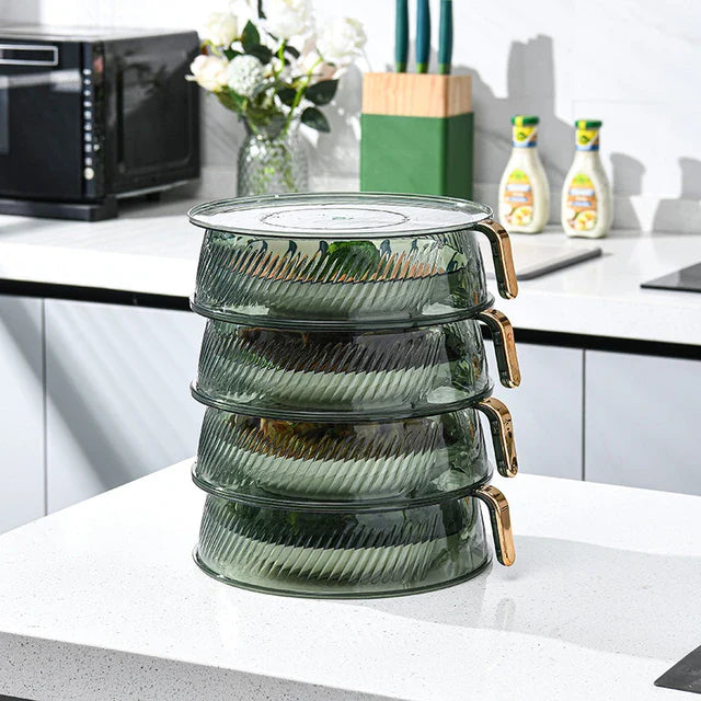 Four plastic food storage containers with handles, stackable for easy storage. Ideal for keeping fruits and vegetables fresh