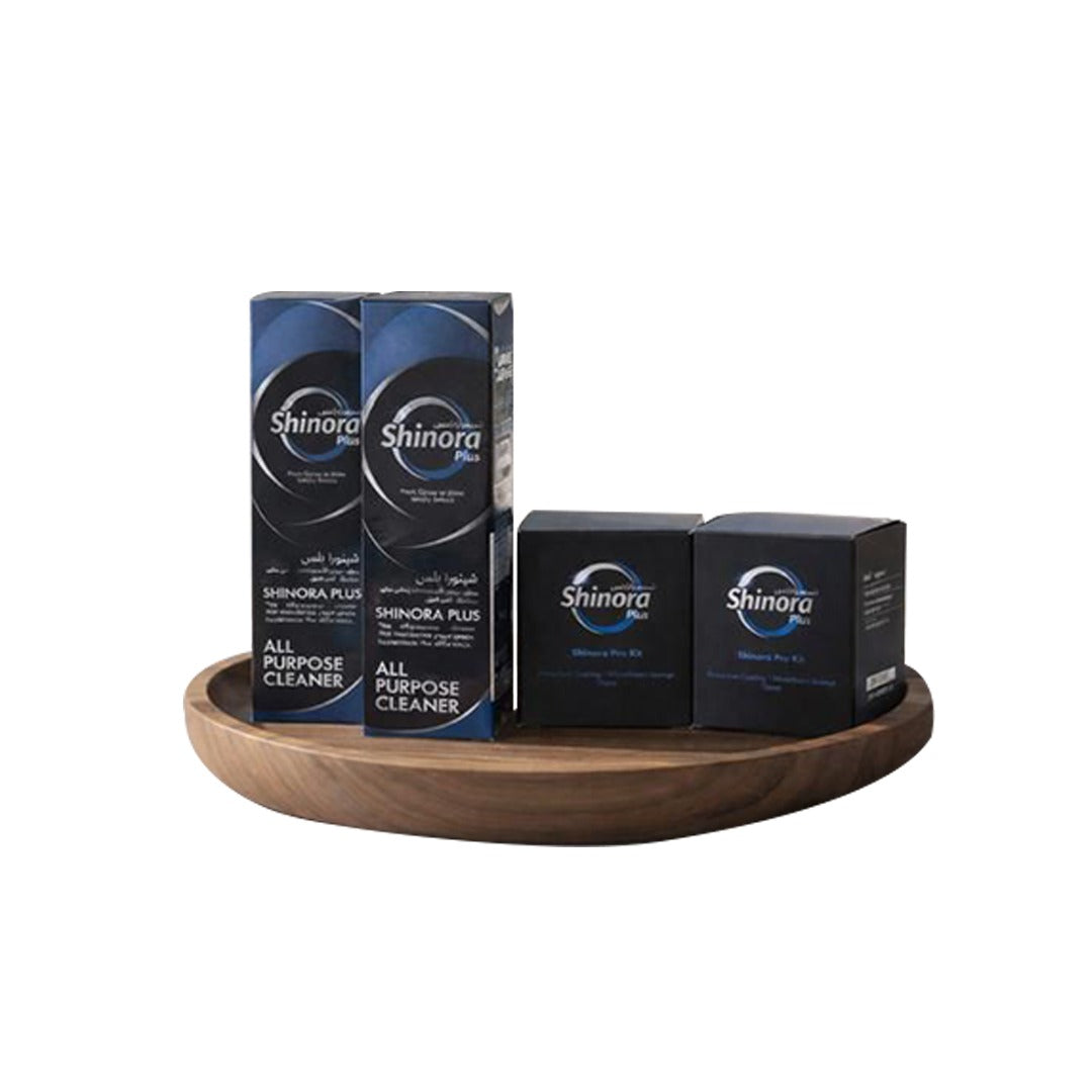 Shinora cleaning products on a wooden tray with a white background