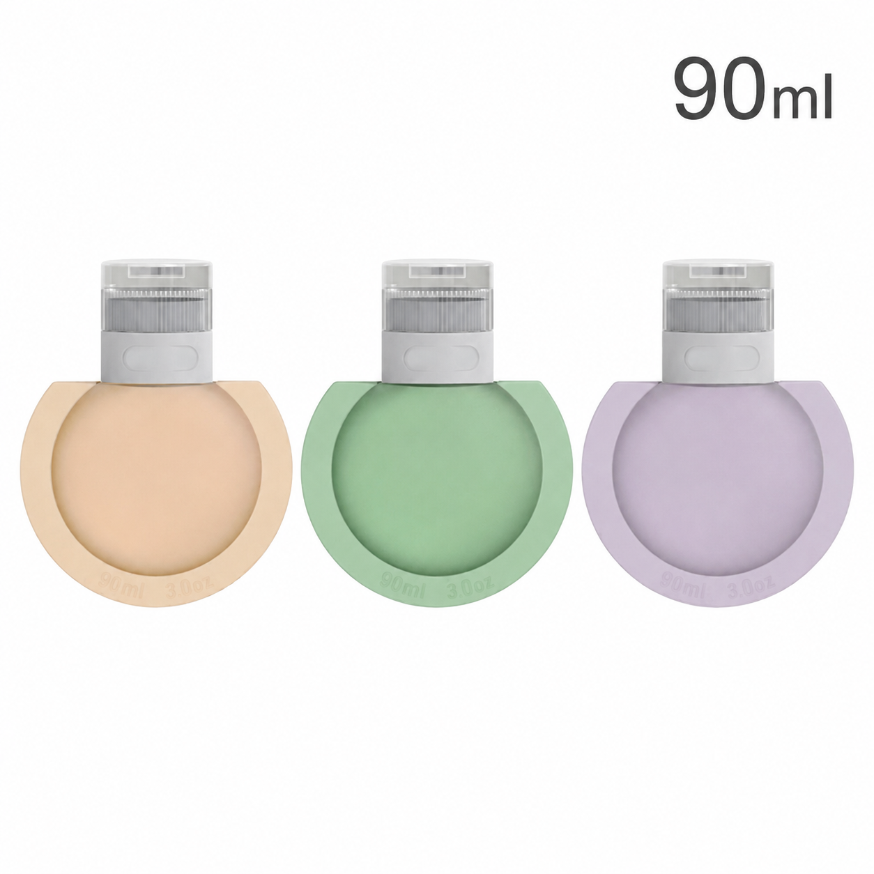 Silicone Travel Bottle Set  in beige, green, and purple with silver lids on a white background.