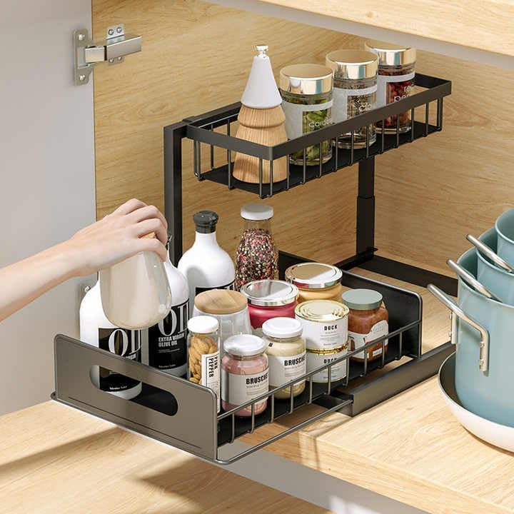 Sliding Storage Rack is placed on kitchen cabinet organized with spices.