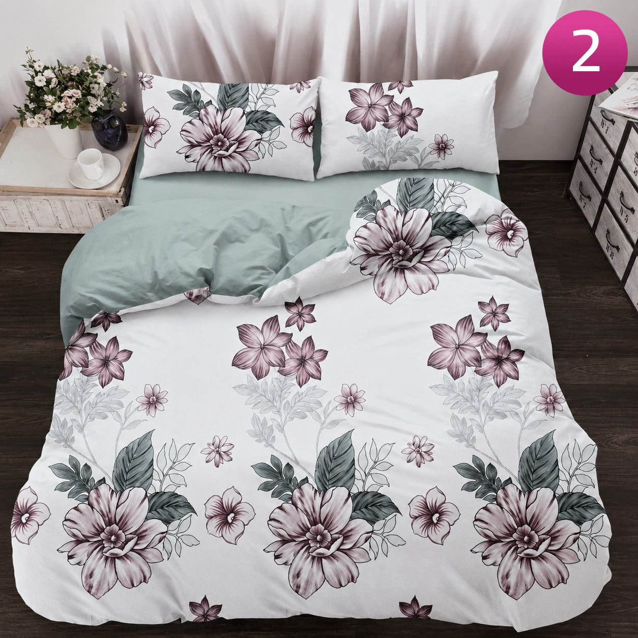 6-piece bedding set with floral comforter, fitted sheet, and pillow covers on a king bed.