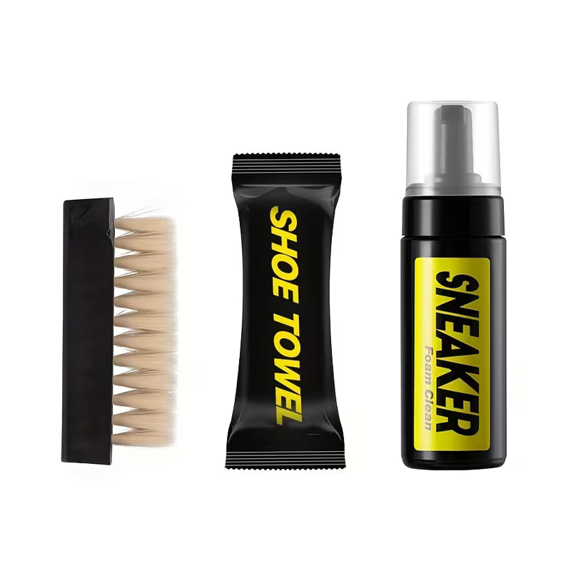 Sneaker Cleaning Kit including a brush, towel, and cleaner on a white background