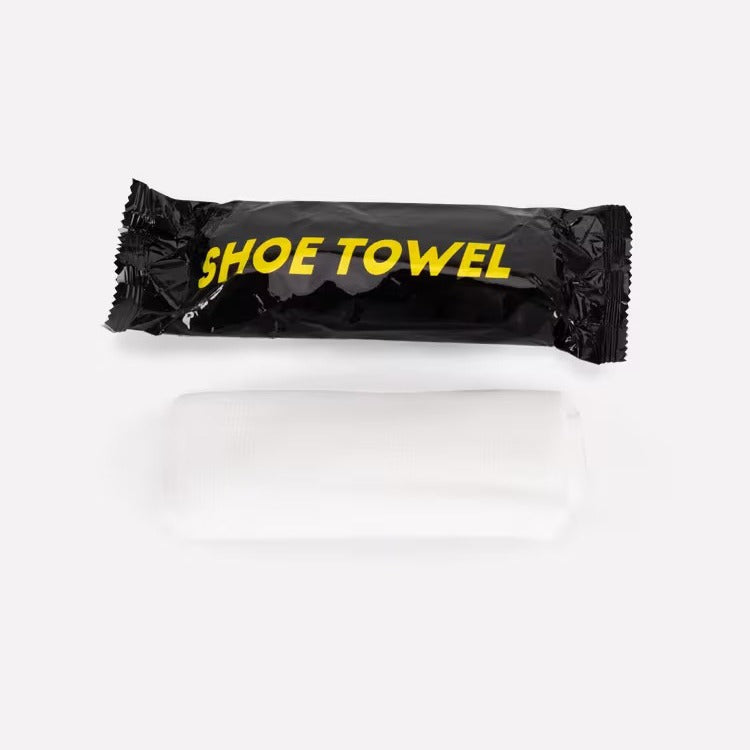 Black shoe towel packaging with yellow text on a white background