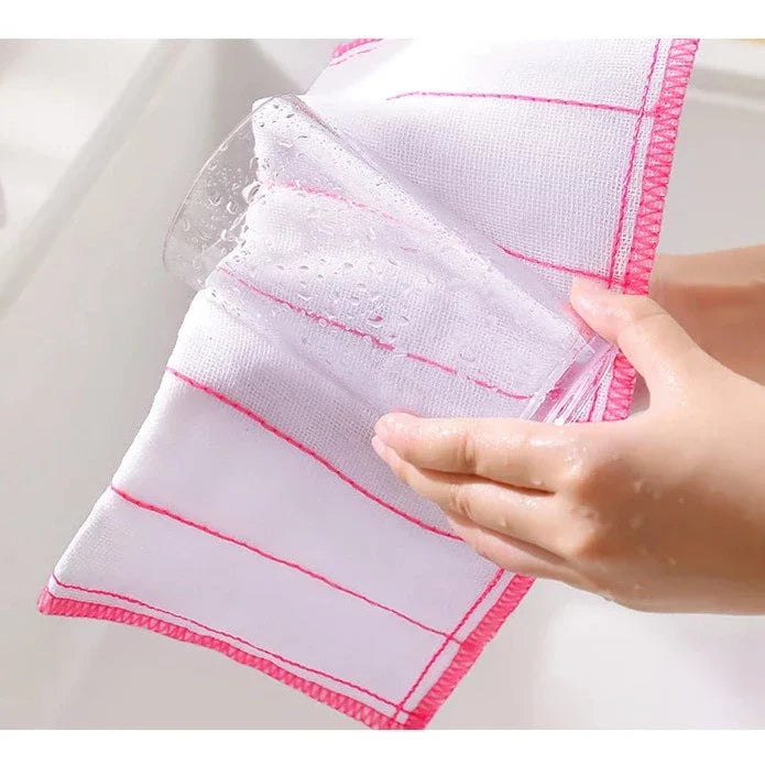 Someone is cleaning glass with the help of a Kitchen Dishwashing Cloth