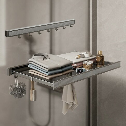 Cloths and other Items are Arranged in a Wall-Mounted Foldable Drying Rack.
