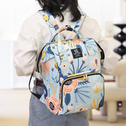 A woman carrying Mother Backpack Bag