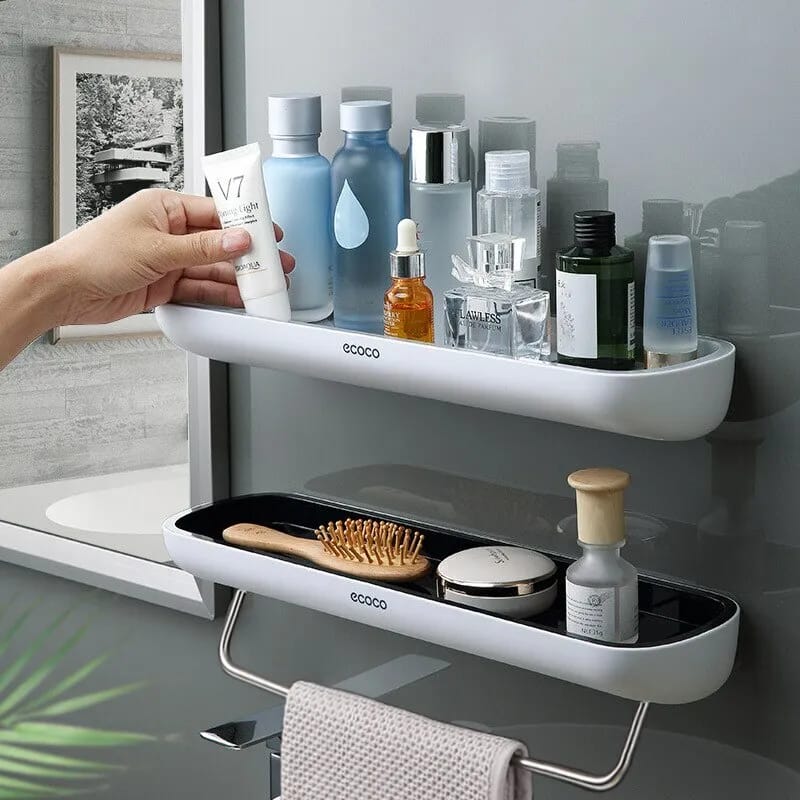 two punch-free storage rack, cleverly mounted on the wall, featuring a practical shelf for organizing essentials