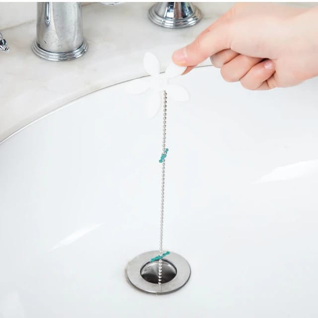Removing Clog From Basin.
