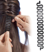 somebody braiding hair for a lady with Hair Braiding Tool