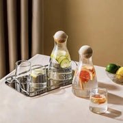 two sets of glass set that has beautiful jug with cork