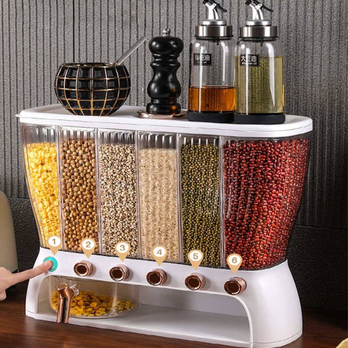 Someone taking something from the 6 Grids ~12 Kg Rice Bucket Grain Organizer