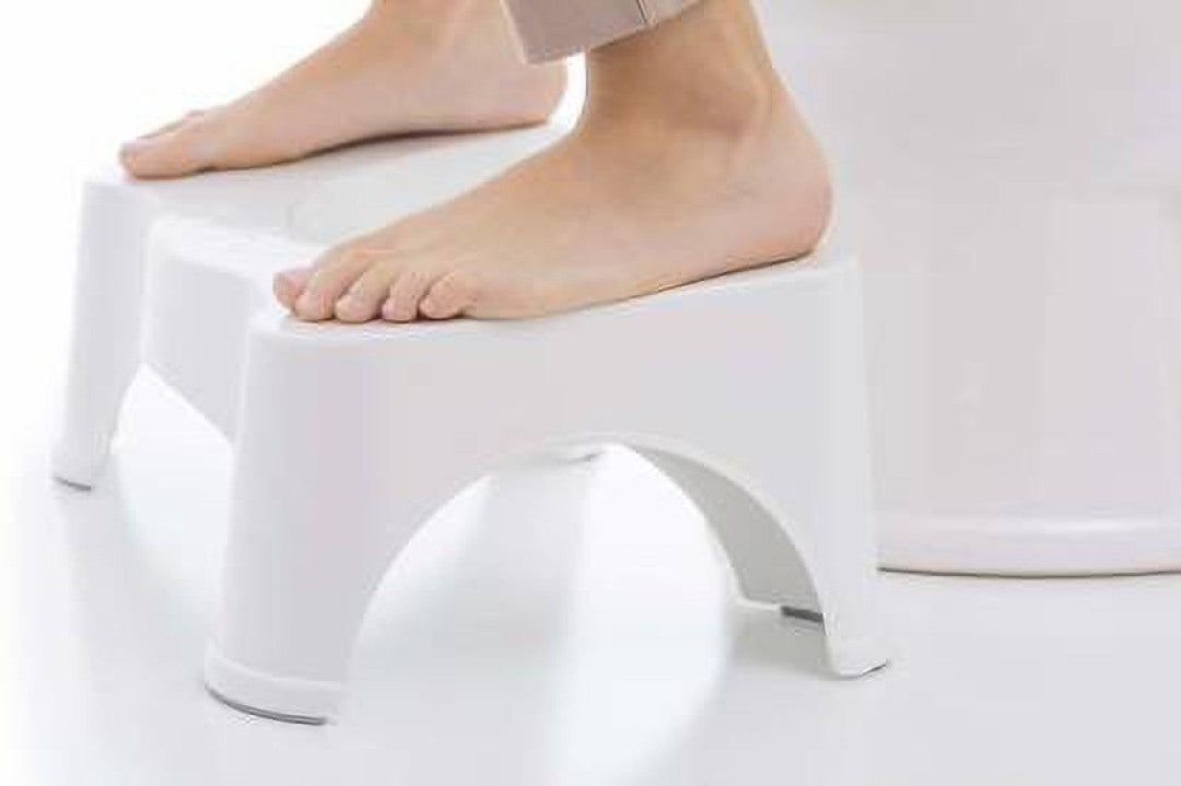A person standing on step stool