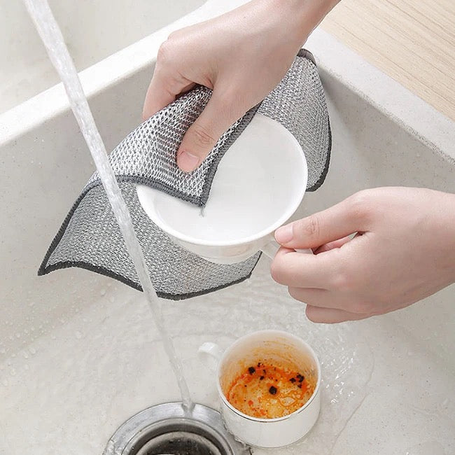 A Cup is Wiping Using Rag.