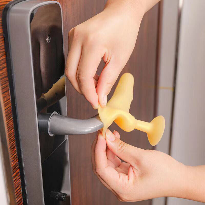 A person installing Silicone Door Knob Cover on a door knob 