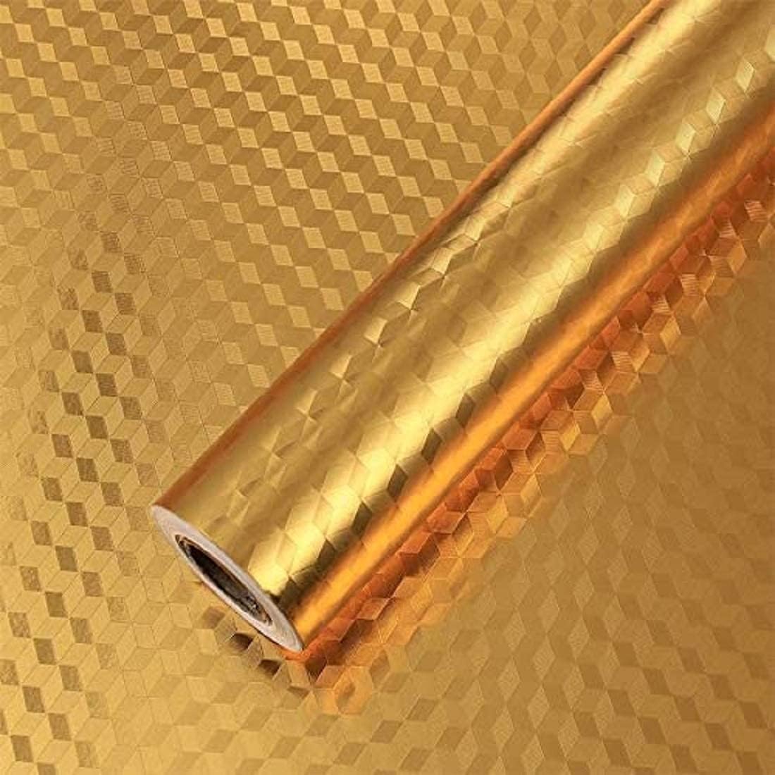 Roll of self adhesive kitchen wallpaper on a textured gold background
