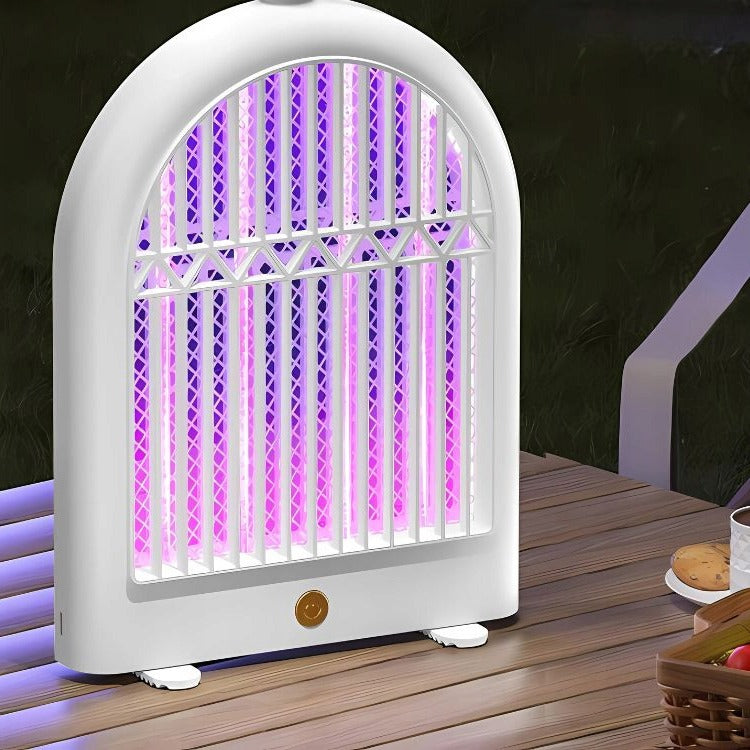 USB Rechargeable Electric Mosquito Killer Lamp with purple light on a wooden surface