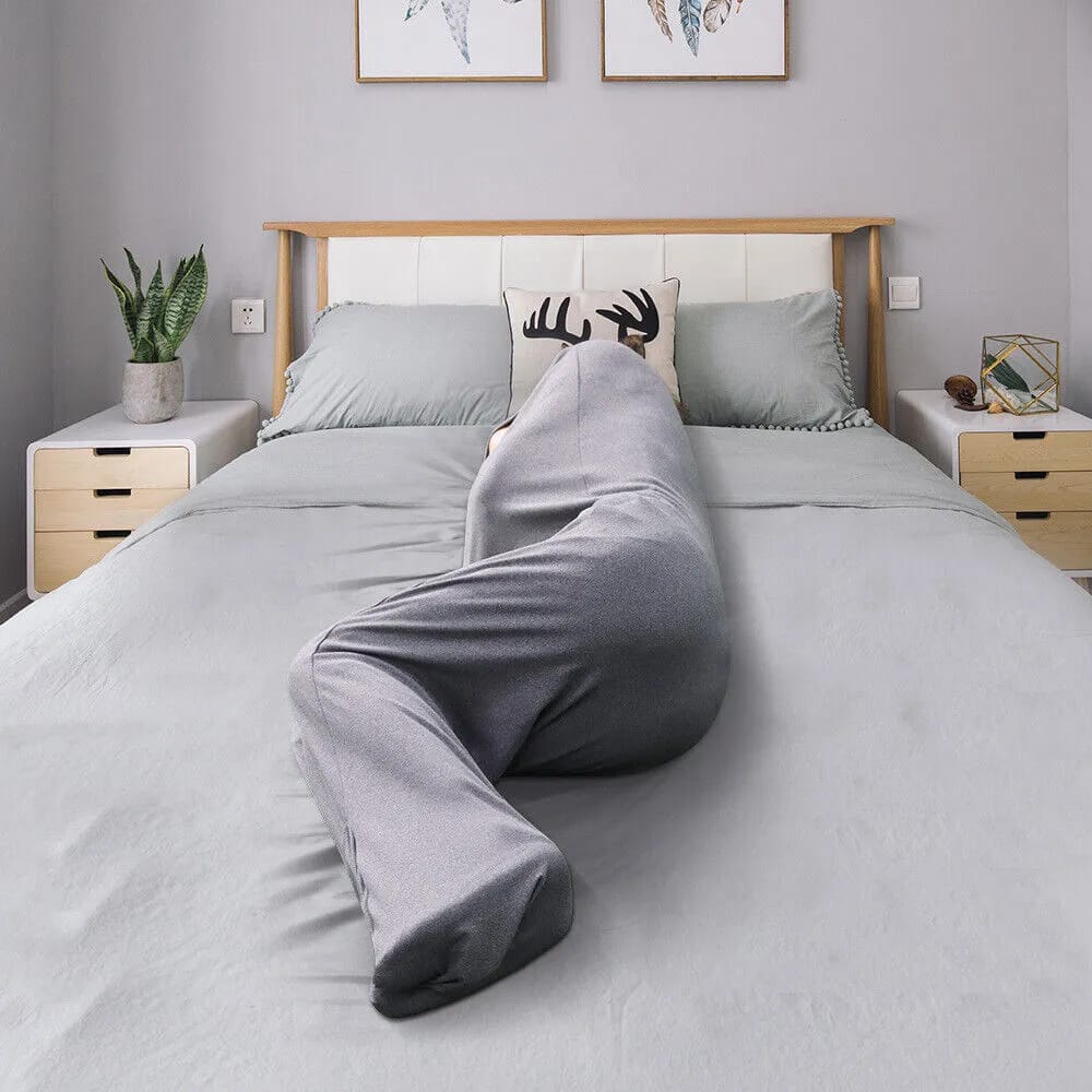 A Man is Sleeping in a Wearable Sleep Pod.